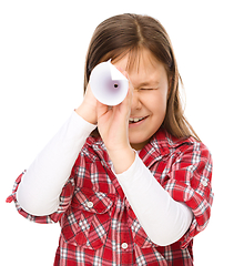 Image showing Cute little girl is looking through spyglass