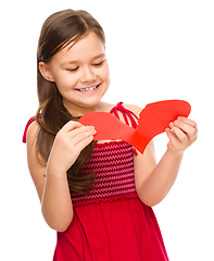 Image showing Portrait of a happy little girl in red