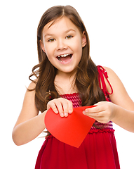 Image showing Portrait of a happy little girl in red