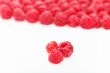 Image showing raspberry berries isolated on white