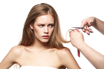 Image showing beautiful girl getting haircut