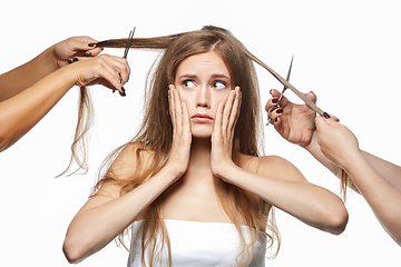 Image showing beautiful girl getting haircut