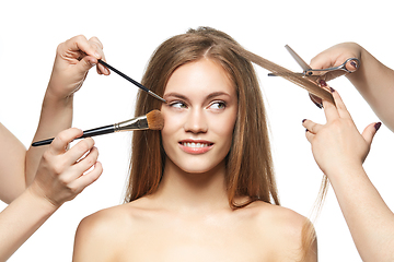 Image showing beautiful girl getting haircut