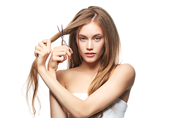 Image showing beautiful girl getting haircut