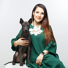 Image showing woman with thai ridgeback puppy