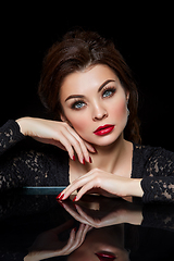 Image showing beautiful young woman with red lips