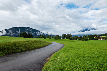 Image showing Beautiful mountains landscape in Switzerland Alps. Winding road