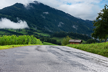 Image showing Beautiful mountains and clouds in Switzerland Alps