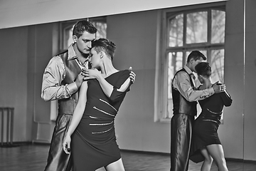 Image showing beautiful couple dancing tango