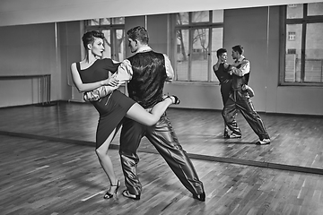 Image showing beautiful couple dancing tango