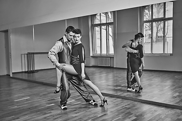 Image showing beautiful couple dancing tango