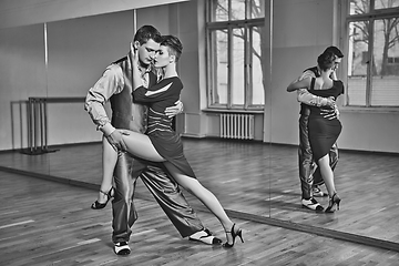 Image showing beautiful couple dancing tango