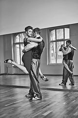 Image showing beautiful couple dancing tango