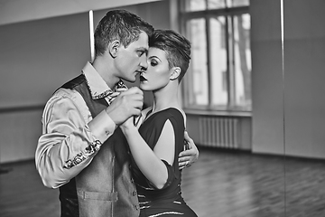 Image showing beautiful couple dancing tango