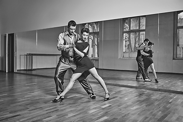 Image showing beautiful couple dancing tango