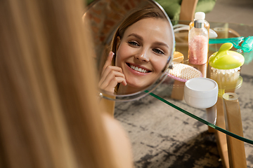 Image showing Beauty Day. Woman doing her daily skincare routine at home
