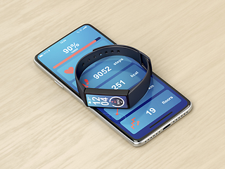 Image showing Smartphone and fitness tracker