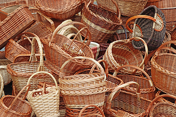 Image showing Bunch of various empty wicker wooden baskets