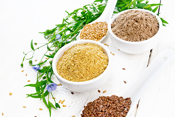 Image showing Bran and flour flaxseed in bowls on light wooden board