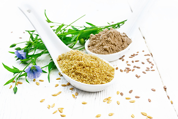 Image showing Bran and flour flaxseed in spoons on white board