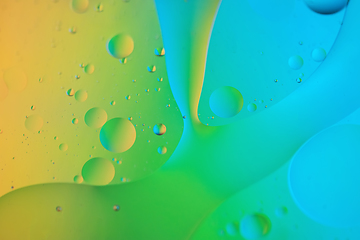 Image showing Colorful abstract background with oil drops on water