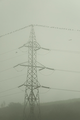 Image showing high voltage electric pillar in fog