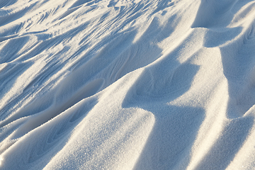 Image showing Snowdrifts, a field in winter