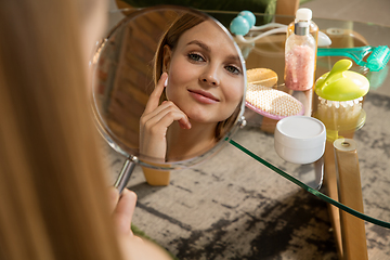 Image showing Beauty Day. Woman doing her daily skincare routine at home