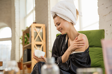 Image showing Beauty Day. Woman doing her daily skincare routine at home