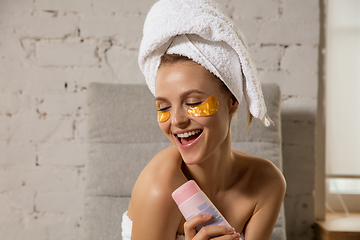 Image showing Beauty Day. Woman doing her daily skincare routine at home