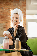 Image showing Beauty Day. Woman doing her daily skincare routine at home