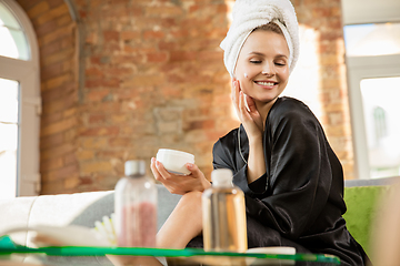 Image showing Beauty Day. Woman doing her daily skincare routine at home