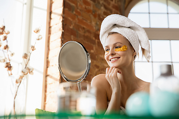 Image showing Beauty Day. Woman doing her daily skincare routine at home