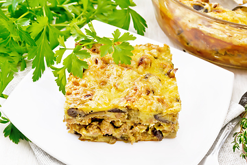 Image showing Casserole of meat and eggplant in plate on white board