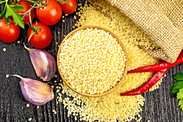 Image showing Couscous raw in bowl on board top