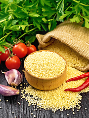 Image showing Couscous raw in bowl on board