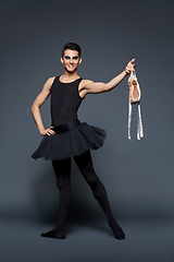 Image showing handsome ballet artist in tutu skirt