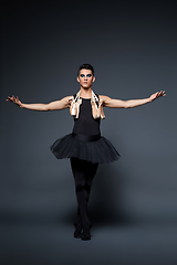 Image showing handsome ballet artist in tutu skirt