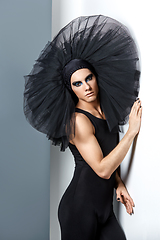 Image showing handsome ballet artist in tutu skirt