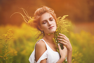 Image showing beautiful girl in field