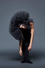 Image showing handsome ballet artist in tutu skirt