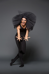 Image showing handsome ballet artist in tutu skirt