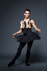 Image showing handsome ballet artist in tutu skirt