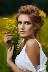 Image showing beautiful girl in field