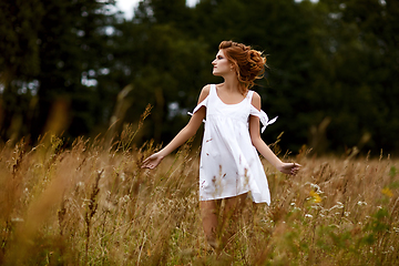 Image showing beautiful girl in field