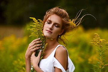 Image showing beautiful girl in field