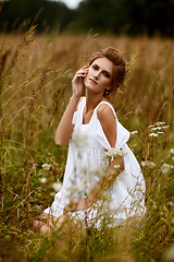 Image showing beautiful girl in field