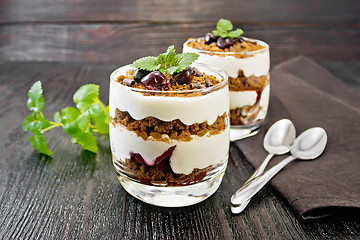 Image showing Dessert Black Forest in two glasses on wooden board