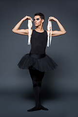 Image showing handsome ballet artist in tutu skirt