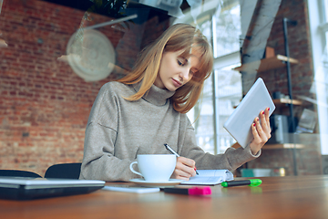 Image showing Beautiful caucasian business lady working in office with laptop